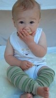 olive and khaki Baby Legs on very cute baby in bodysuit