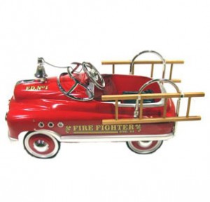 1930s metal fire fighter in red with bell and ladder