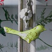  Set of three vintage-style tin hanging birds