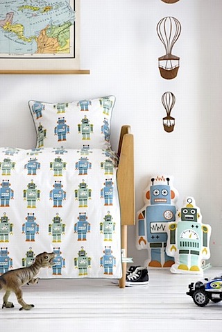 ferm living bedroom with robot bedding and cushions